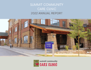 Exterior view of Summit Community Care Clinic building, featuring a stone façade, welcoming entrance, and signage, showcasing the 2022 Annual Report.
